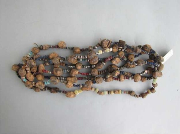 Necklace made from root tubers and glass beads