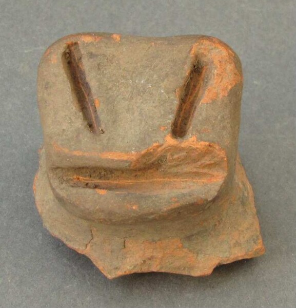 Fragment of a clay vessel