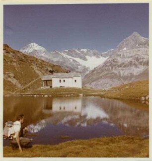Der Schwarzsee mit Wallfahrtskapelle und Alpenpanorama