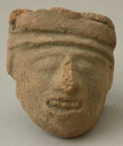 Clay head (fragment)