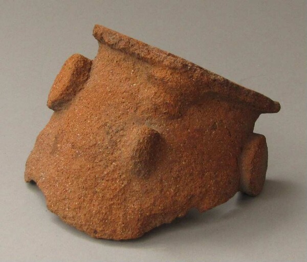 Fragment of a clay vessel