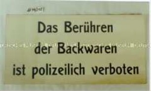 Schild "Das Berühren der Backwaren ist polizeilich verboten"