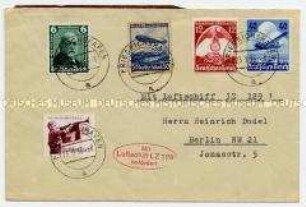 Briefumschlag mit Sonderbriefmarken und -stempeln "Mit Luftschiff LZ 129 befördert"
