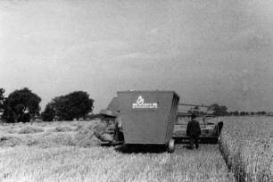 Spreusammelwagen am Mähdrescher