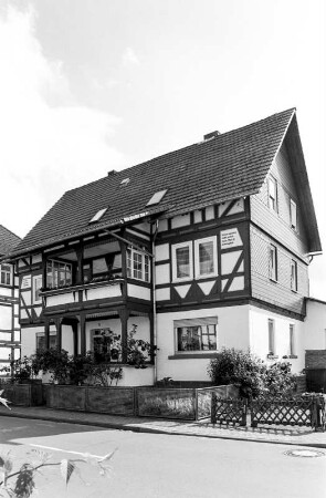 Wohnhaus (Wohnhaus, Ziegelmauerwerk und Fachwerk); Rosenthal, Marburger Straße 5