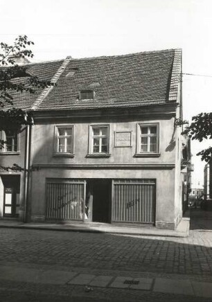 Kreuzburg, Geburtshaus von Gustav Freytag : Kreuzburg (Kluczbork/Polen). Geburtshaus Gustav Freytag. Inschrifttafel: "Hier wurde am 13. Juli A.D. 1861 Dr. Gustav Freytag geboren"