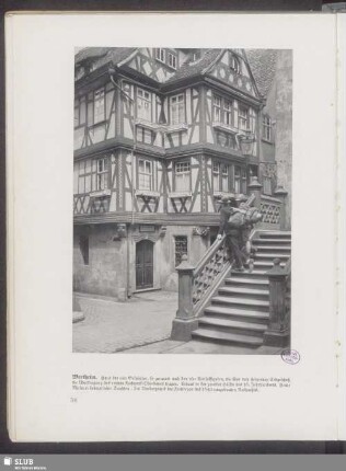 Wertheim. Haus der vier Gekrönten, so genannt nach den vier Konsolfiguren, die über dem steinernen Erdgeschoß die Übertragung des reichen Fachwerk-Oberbaues tragen