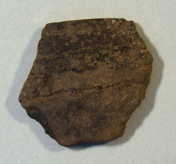 Fragment of a clay vessel