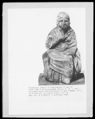 Sitzende Frau