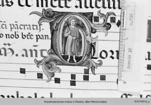 Buchseite mit Text, Neumen und historisierter Initiale G(loria), darin der heilige Pankratius - Corale