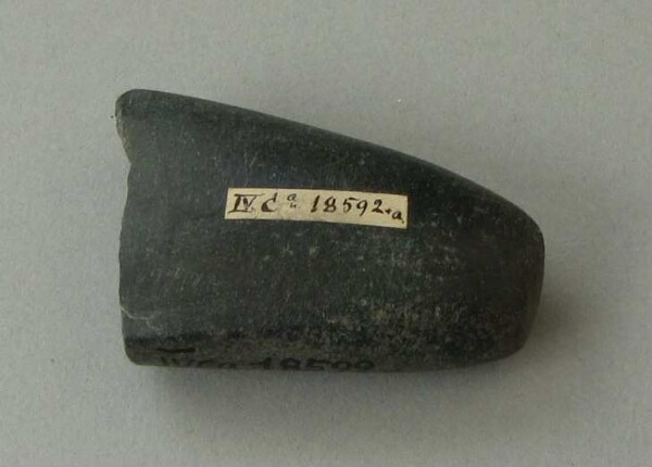 Stone axe blade (fragment)