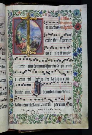 Zierseite mit Bordürenrahmen, Initiale mit Miniatur: I(n medio ecclesie): Johannes auf Patmos