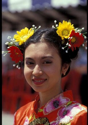 Georgetown, Frau in traditioneller malaysischer Tracht