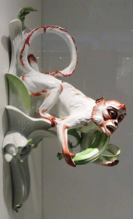 Wandleuchter mit der Figur eines Affen