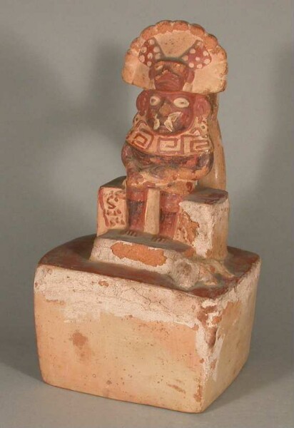 Application: anthropo-zoomorphic figure on a throne