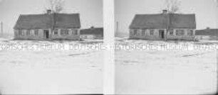 Ein Bauernhaus im Schnee