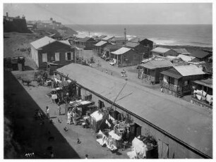 Straße parallel zum Strand von San Juan : Weltreisen. Straße parallel zum Strand von San Juan. Blick zur Festung San Felipe del Morro