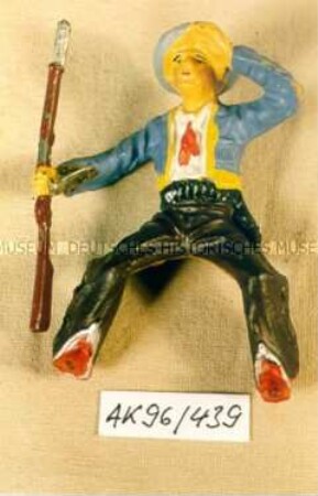 Reitender Cowboy, spähend