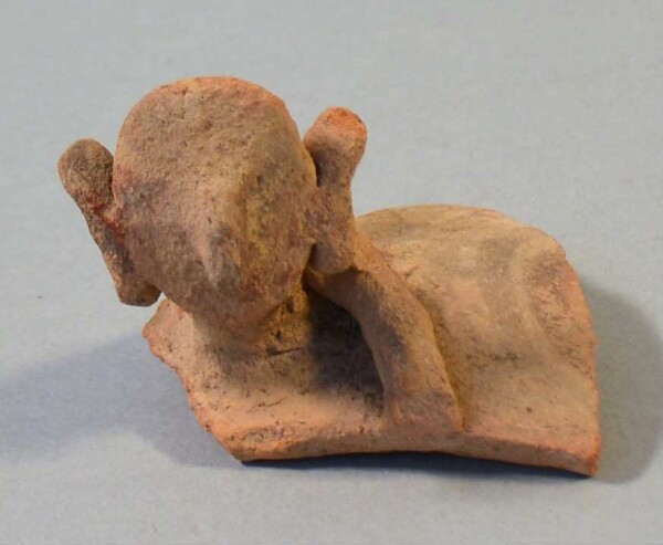 Clay figure (vessel fragment)