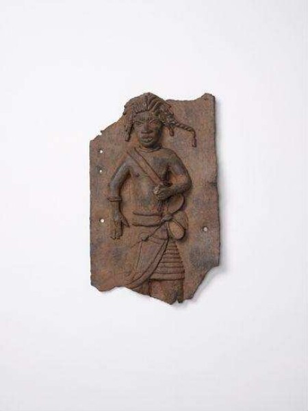 Bronze, man with "pigtail hairstyle" and belly bow