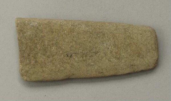 Stone axe blade (?)