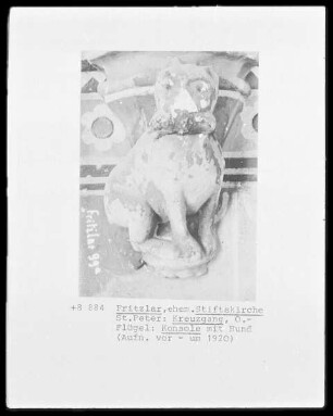 Konsole mit der Figur eines Hundes