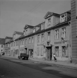 Potsdam. Holländisches Viertel, Blockfronten von Wohnhäusern, mit Gasthof "Schwarzer Adler"