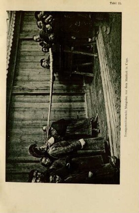 Tafel 11. Trompeten blasende Mongolen vor dem Maidari in Urga