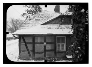 Baruth/Mark-Glashütte, Hüttenweg 8. Arbeiterwohnhaus (um 1840). Gartenfront (Teilansicht)
