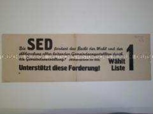 Maueranschlag mit einem Zitat aus dem Wahlprogramm der SED