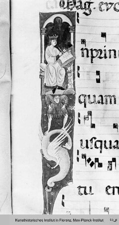 Antiphonar : Textseite mit vierzeiligen Neumen und Miniatur auf der Randleiste: Salomo schreibt, Atlant, Fabeltier
