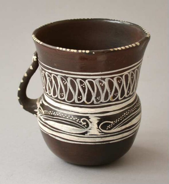 Clay jug with handle