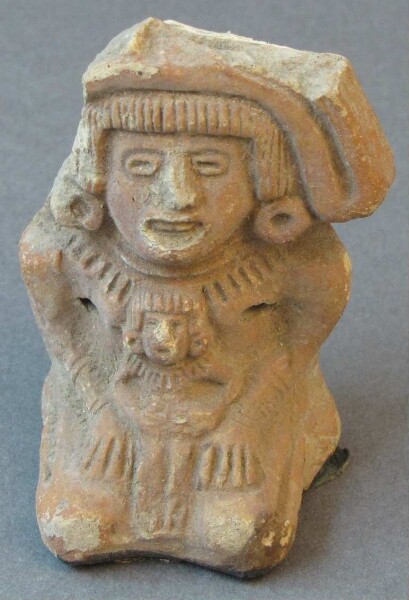 Clay figure (fragmented)