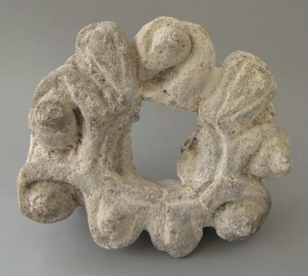 Stone rosette (stucco fragment)