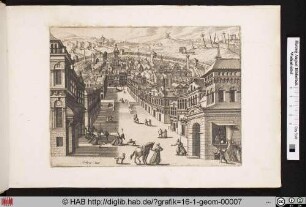 Blick auf eine von Häusern begrenzte Straße, die in eine von einer Mauer umgebene Stadt führt.
