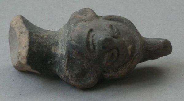 Fragment of a clay rattle (clay head)