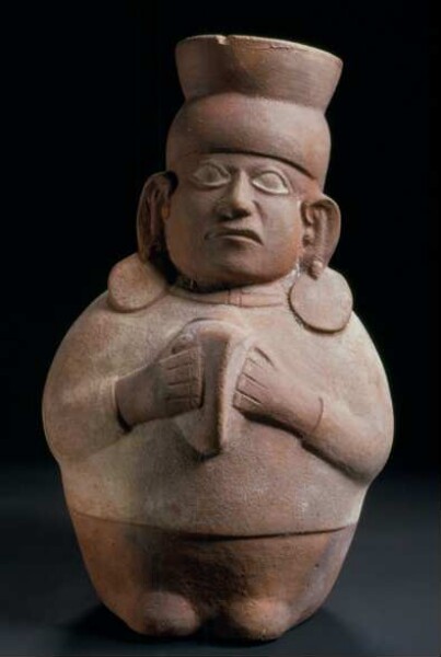 Anthropomorphic standing figure with a queen conch