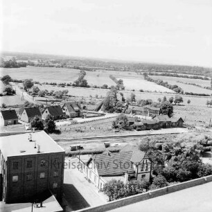 Vogelperspektive: Blick nach Westen vom Getreidesilo der Mühle W. F. Stoltenberg am Bahnhof: Werkshäuser: hinten rechts der Bahnhof