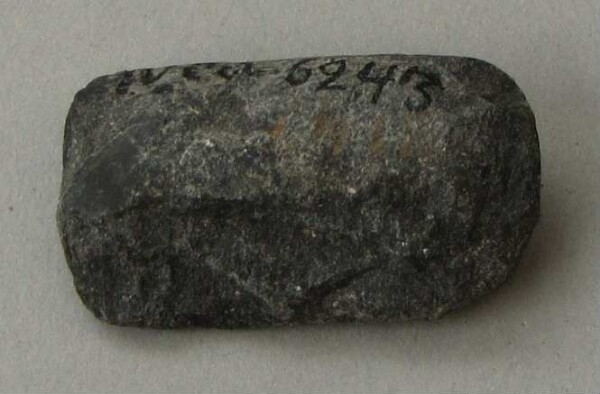 Stone axe blade (fragment)