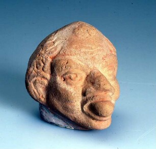 Grotesker männlicher Kopf