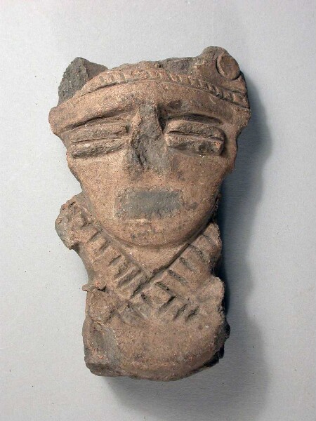 Figurine en argile (fragment)