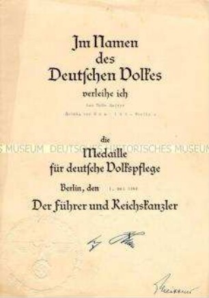 Urkunde zur Verleihung der Medaille für deutsche Volkspflege