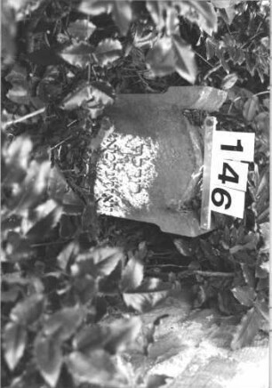 Grabstein 146 (Index: 100114338) Material: Sandstein Zustand: verwittert Maße HxBxT: 27x30x12 cm Beschreibung: Stele, giebelartiger Abschluß mit Eckakroteren Besonderheit: Kindergrab: Grabstein 146
