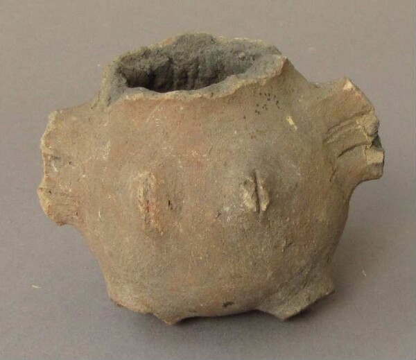 Fragment of a clay vessel