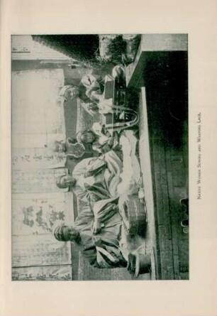 Native women sewing and weaving lace