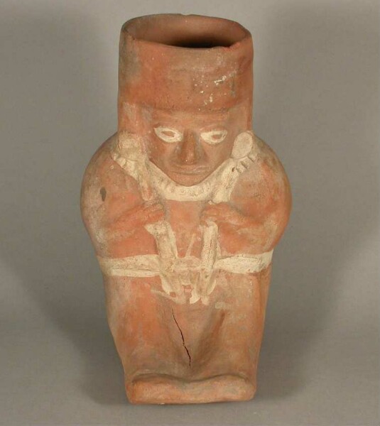 Seated anthropomorphic figure