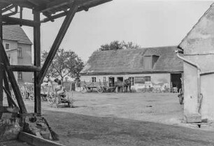 Darlehenskasse Guttau : Guttau. Darlehnskasse. Hofansicht mit Pferdefuhrwerken