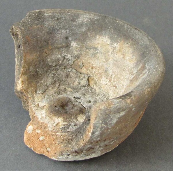 Fragment of a clay vessel