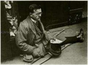 Kriegsversehrter Bettler