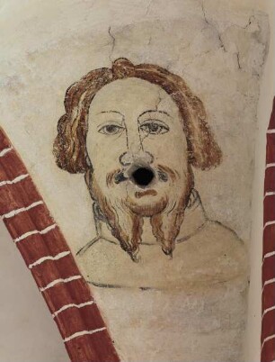 Brustbild eines bärtigen Mannes mit Kondenswasseröffnung als Mund
